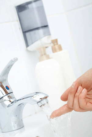 Discoloured Hot Water? Here’s What it Means