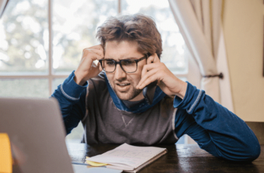 a man struggling with DIY HVAC repairs at home