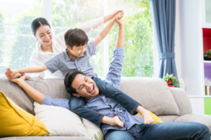 family inside their home enjoying fresh, clean air