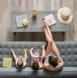 A family maintains their air conditioner and enjoys a cool home all summer