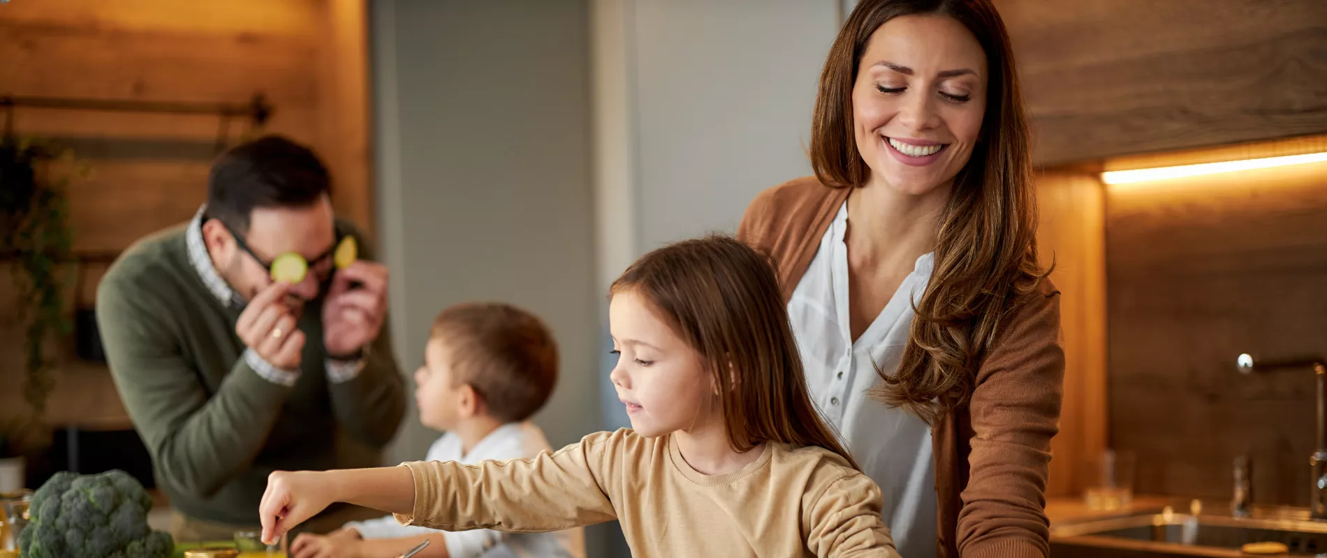 Calgary family cooking together in their warm home