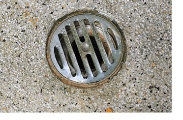 floor drain in a residential Calgary furnace room